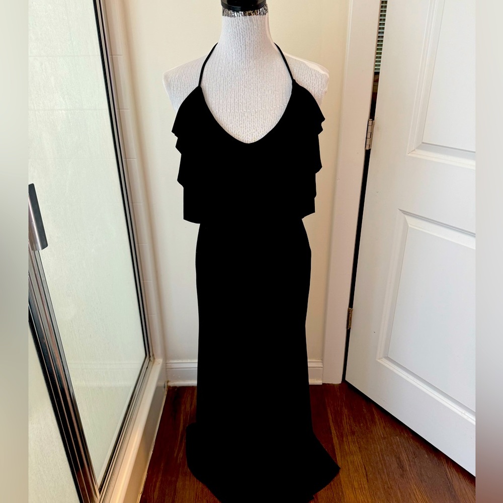 AA Studio Black stretchy with frills at the top of chest size medium